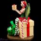Preview: Weihnachtsfee "Merry" hält ein Geschenk